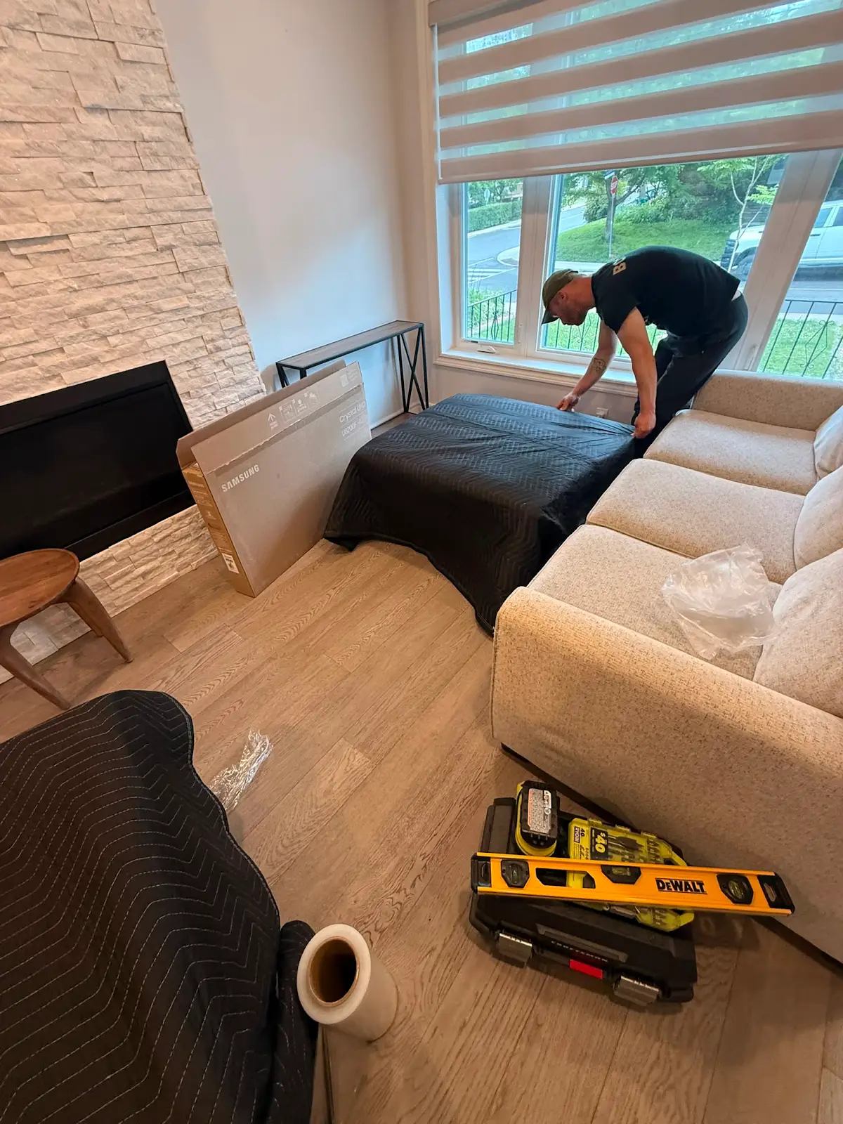 Protective blankets wrapped around furniture